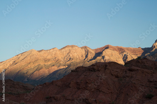 Desert landscape. Beautiful view of the red sandstone  canyon  valley and mountains at sunset in Talampaya national park in La Rioja  Argentina.