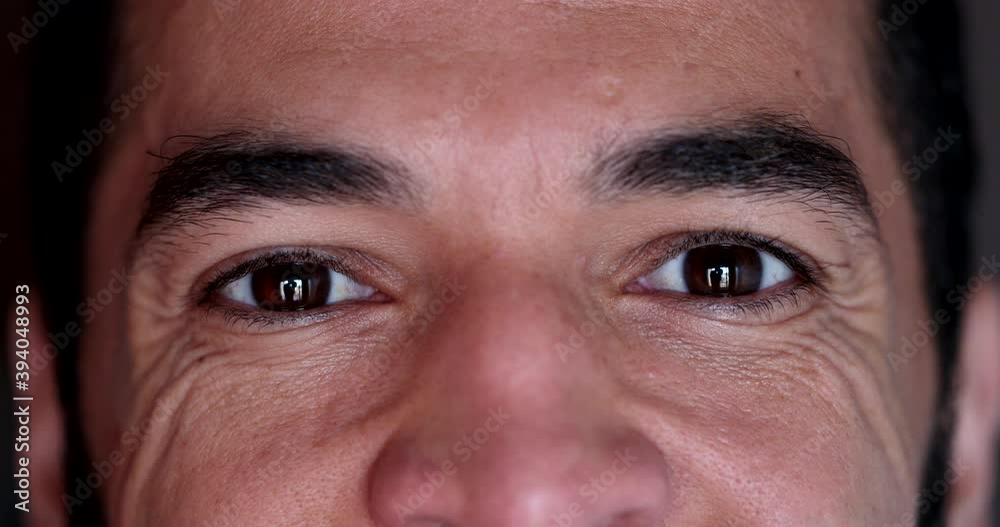Wrinkled man opening eyes smiling at camera. Macro close-up man in 40s feeling relaxed Wrinkled man opening eyes smiling at camera. Macro close-up man in 40s feeling relaxed