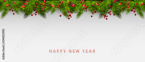 Element of the Christmas composition. Green spruce branches, red rowan berries