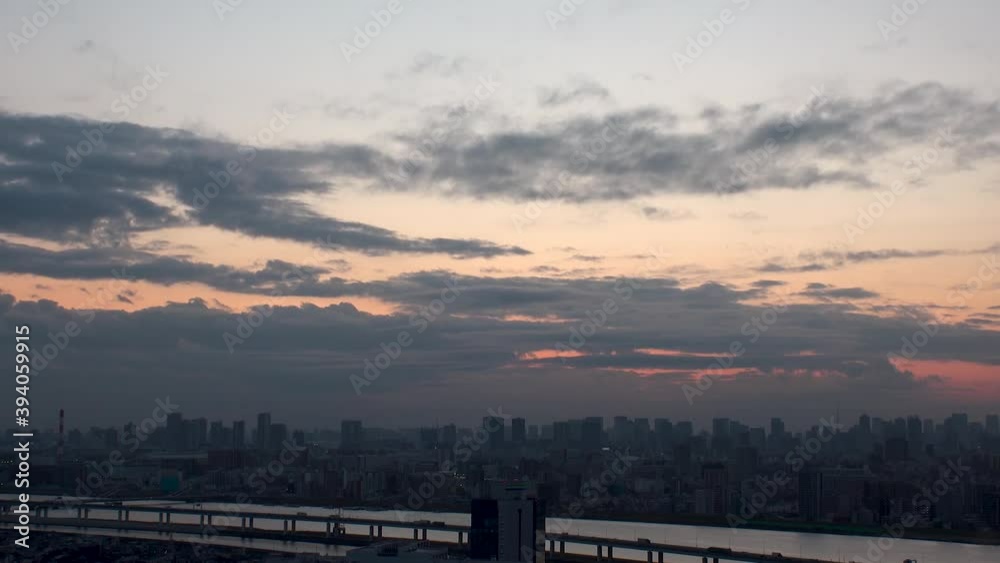 TOKYO, JAPAN : Aerial high angle sunrise CITYSCAPE of TOKYO. View of central downtown area around Minato ward. Japanese urban metropolis concept. Long wide time lapse zoom out shot night to morning. TOKYO, JAPAN : Aerial high angle sunrise CITYSCAPE of TOKYO. View of central downtown area around Minato ward. Japanese urban metropolis concept. Long wide time lapse zoom out shot night to morning.