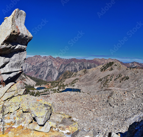 Red Pine Lake mountain landscape scenic view from White Baldy and Pfeifferhorn hiking trail, towards Little Cottonwood Canyon, Wasatch Rocky mountain Range, Utah, United States. 