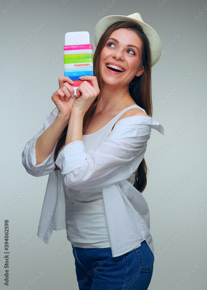 Happy woman raised arms up with passport and ticket. Happy woman raised arms up with passport and ticket.