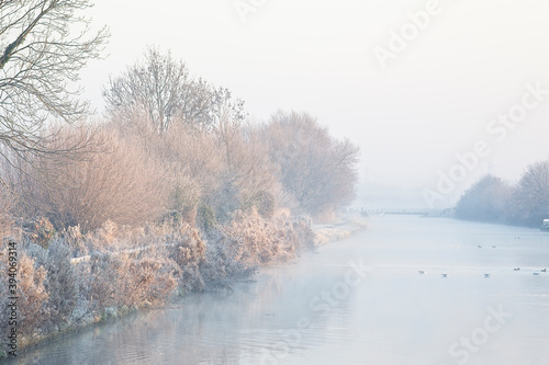 The Gloucester and Sharpness Canal on a cold winter's morning, from Patch Bridge, Gloucestershire, England, UK.