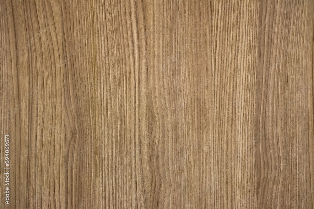 Wood grain texture vertical brown background. Wood grain texture vertical brown background.