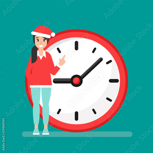 smiling girl with red clock and Santa Hat isolated on blue background.