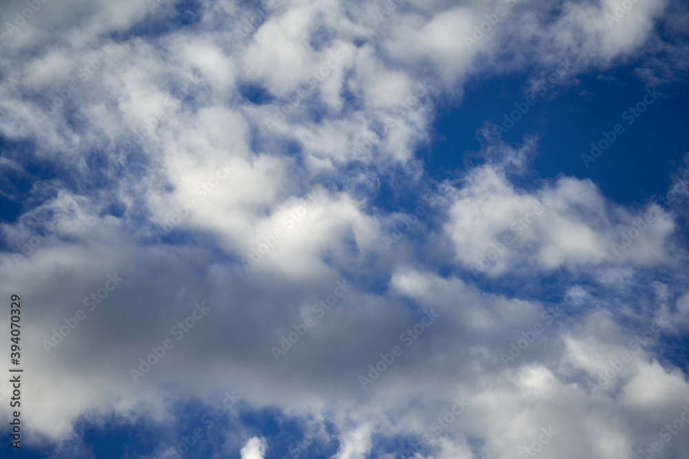 Frequent clouds species against a blue sky, full screen Cumulus genus. Frequent clouds species against a blue sky, full screen Cumulus genus.