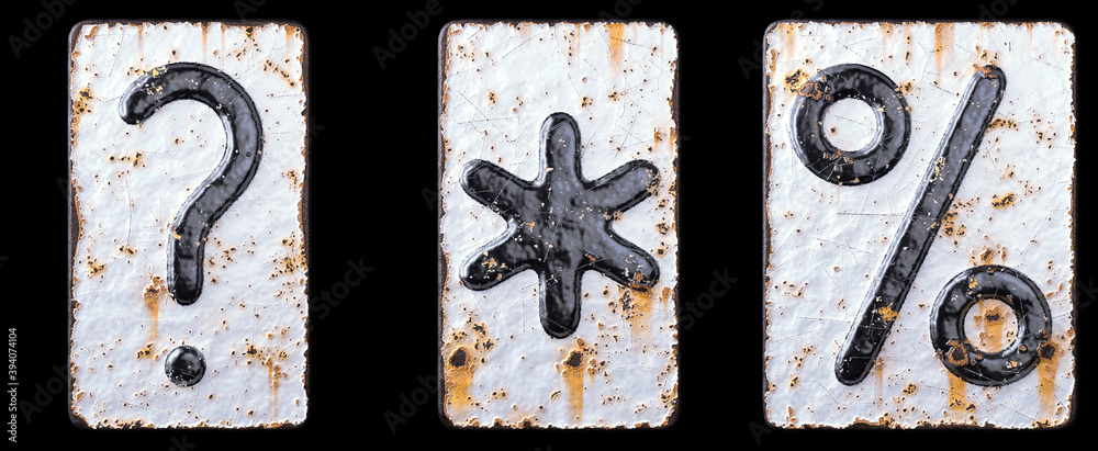 Set of symbols question mark, asterisk, percent made of forged metal on the background fragment of a metal surface with cracked rust.