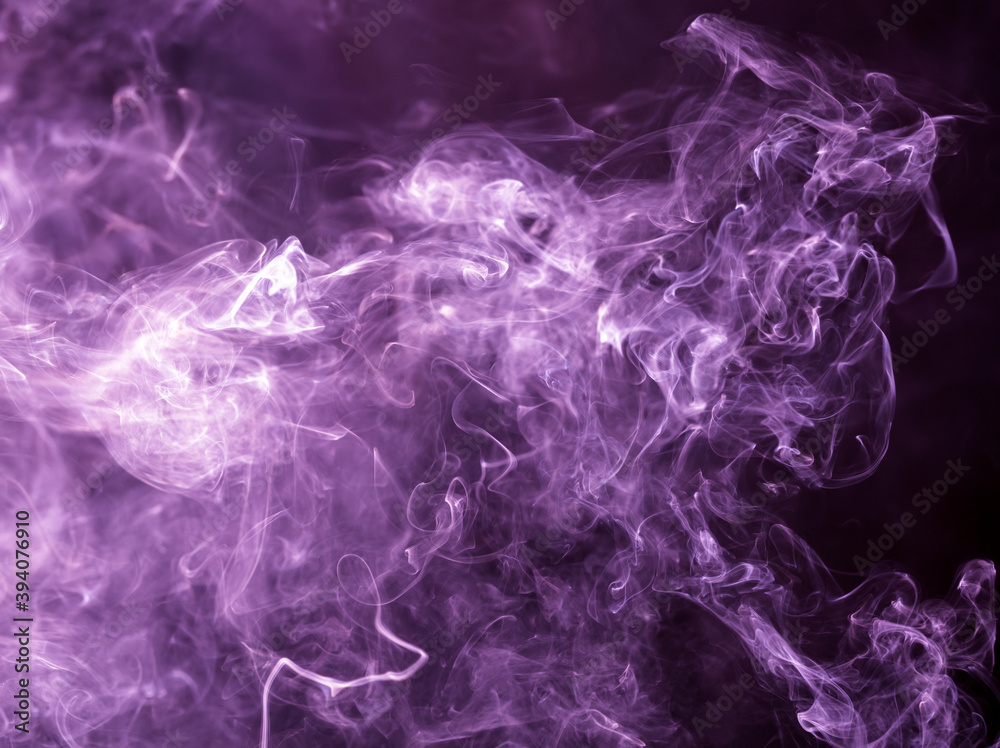 Obraz premium Purple smoke isolated on black background. Abstraction