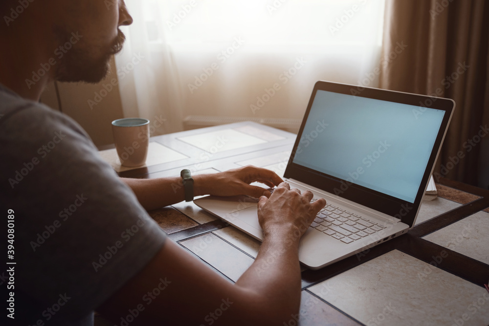 Man Working From Home Having Online Group Videoconference On Laptop