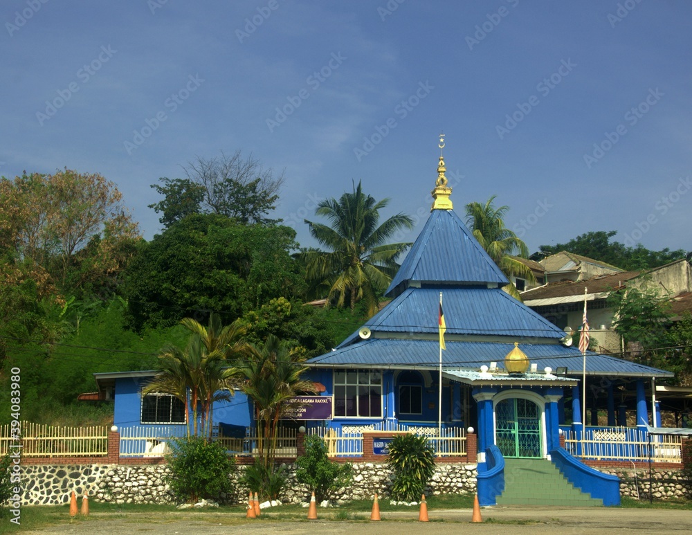 a traditional blue color mosque in Port Dickson town Malaysia
