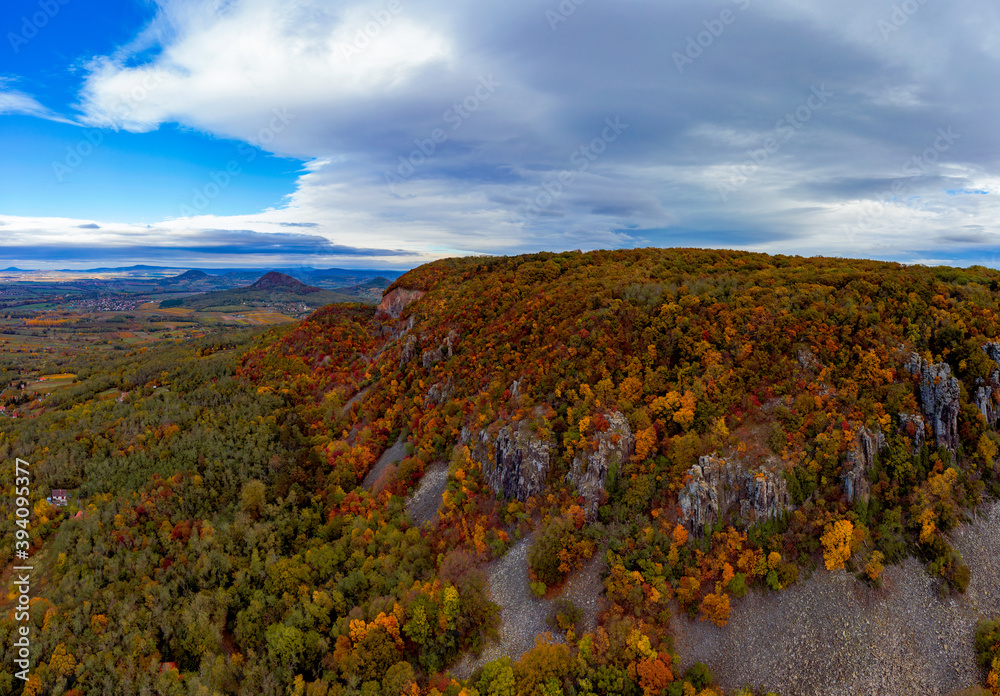 Saint Gerorge Hill in Hungary badacsony region. Amazing vulcanic mountain where giant basalt columns located. Beautiful autumn colorful photo. Perfedct place for hiking or tripping Saint Gerorge Hill in Hungary badacsony region. Amazing vulcanic mountain where giant basalt columns located. Beautiful autumn colorful photo. Perfedct place for hiking or tripping