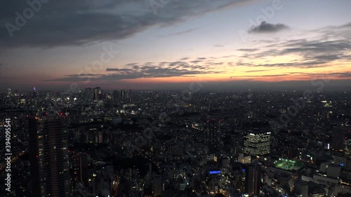 Wallpaper Mural TOKYO, JAPAN : Aerial high angle sunrise CITYSCAPE of TOKYO. View of buildings around Shinjuku and Nakano ward, shot from Ikebukuro city. Long time lapse shot night to morning. Torontodigital.ca