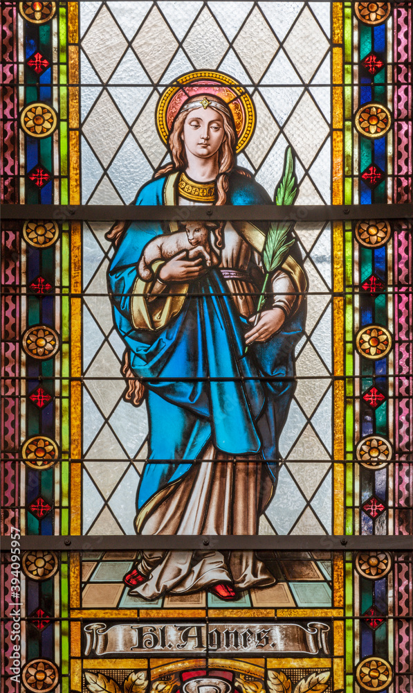 VIENNA, AUSTIRA - OCTOBER 22, 2020: The St. Agnes on the stained glass of church Laurentiuskirche by workrooms from Czech and Austria (end of 19. cent.).