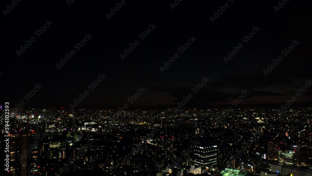 TOKYO, JAPAN : Aerial high angle sunrise CITYSCAPE of TOKYO. View of buildings around Shinjuku and Nakano ward, shot from Ikebukuro city. Long time lapse shot night to morning. TOKYO, JAPAN : Aerial high angle sunrise CITYSCAPE of TOKYO. View of buildings around Shinjuku and Nakano ward, shot from Ikebukuro city. Long time lapse shot night to morning.