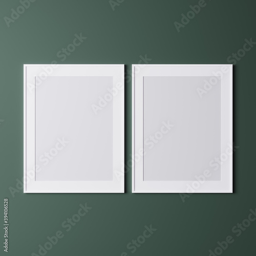 Fototapeta Naklejka Na Ścianę i Meble -  Two vertical white frame on green wall, poster mock up, 3d rendering