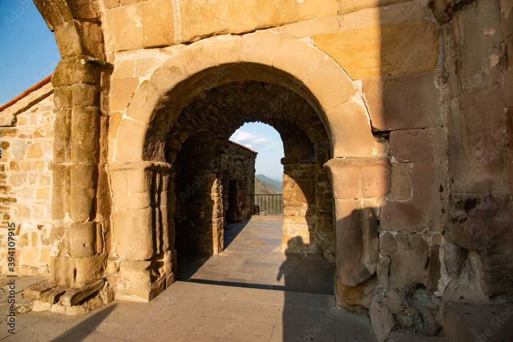 Fototapeta premium ancient stone gate in the monastery