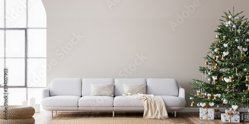 Living Room Christmas interior in Scandinavian style. Christmas tree with gift boxes. white sofa on wall Mockup.	