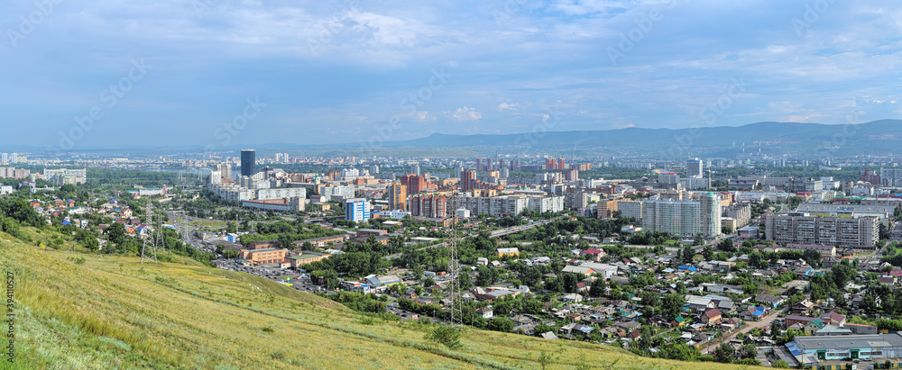 Panorama of Krasnoyarsk, Russia. View from the lookout point near the Paraskeva Pyatnitsa Chapel on the top of Karaulnaya Mountain.