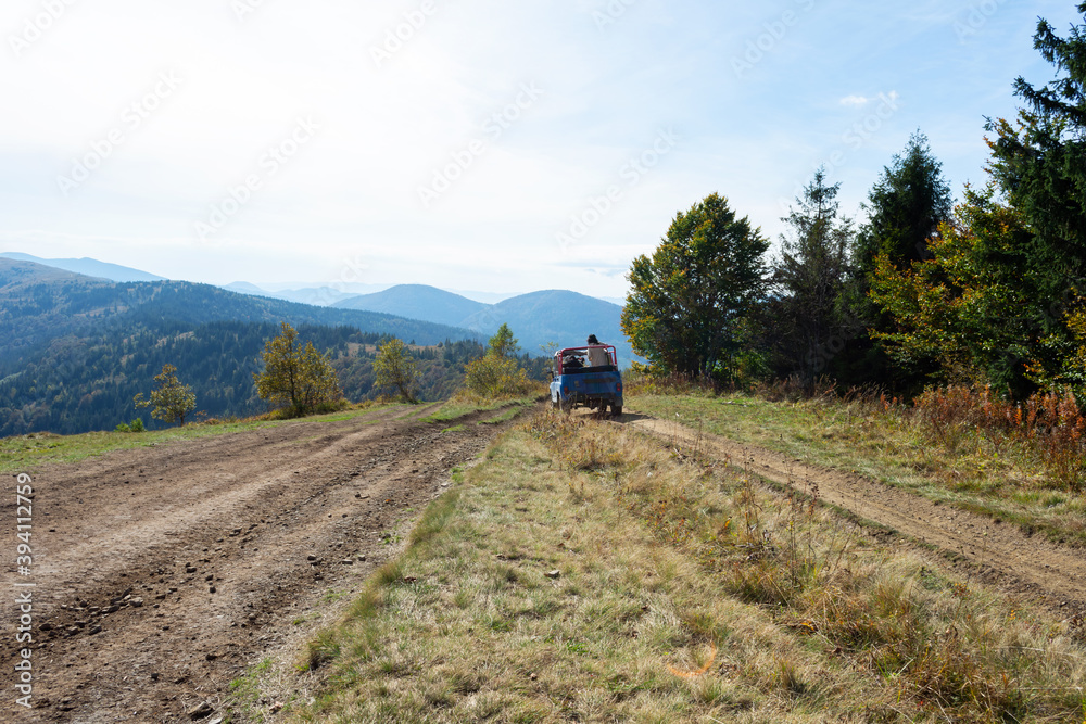 SUV on a country mountain road. The Carpathians. Ukraine. Travels.