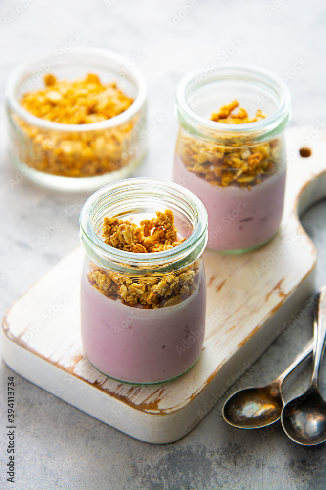 Healthy breakfast. Yogurt jars with granola. Copy space. Healthy breakfast. Yogurt jars with granola. Copy space.