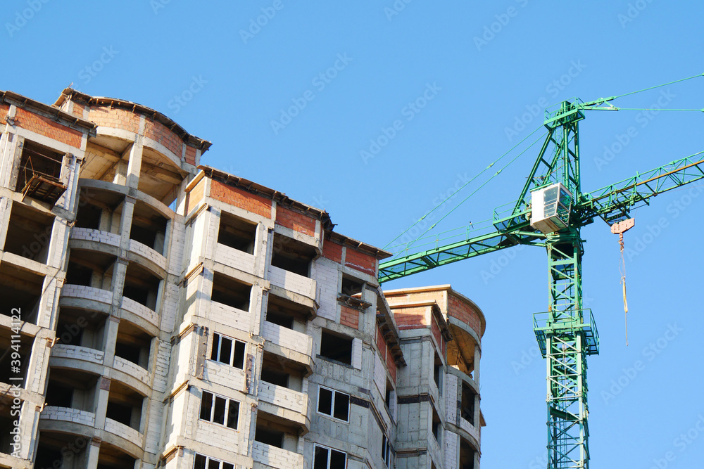 Construction site background. Crane near building. Industrial background.