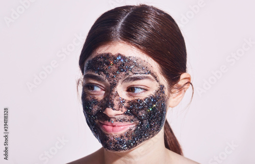 Cute Woman Using Stars Skincare Face Mask