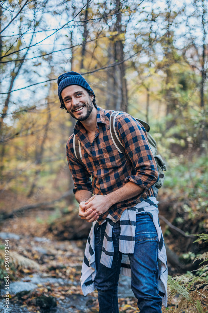 young handsome man exploring the nature young handsome man exploring the nature