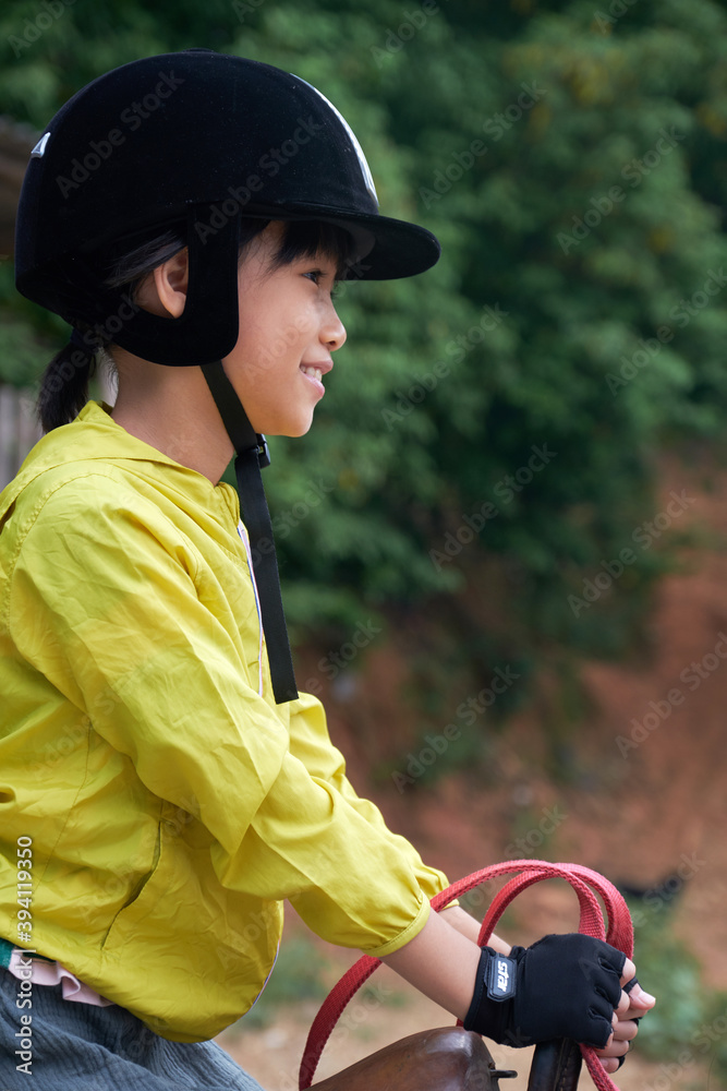 Asian girl and horses, life on the racetrack Asian girl and horses, life on the racetrack