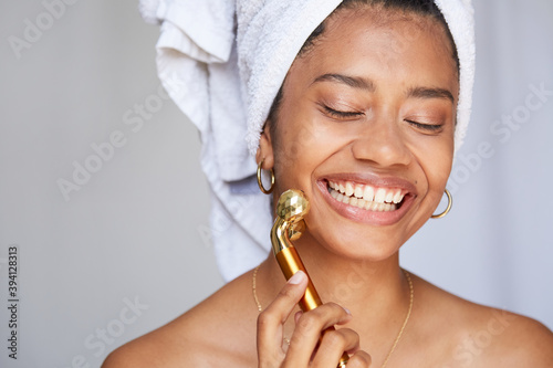 Gorgeous woman enjoys face massage