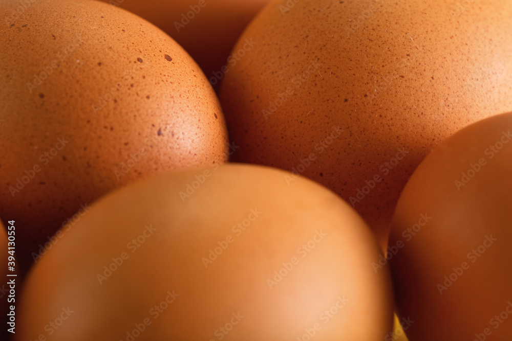 Beige coloured eggs shell with spots closeup detail Beige coloured eggs shell with spots closeup detail