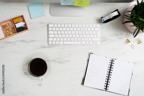 Office Desk With Blank Notebook photo