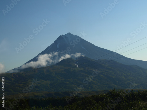 Vilyuchinsky volcano on a background of blue sky