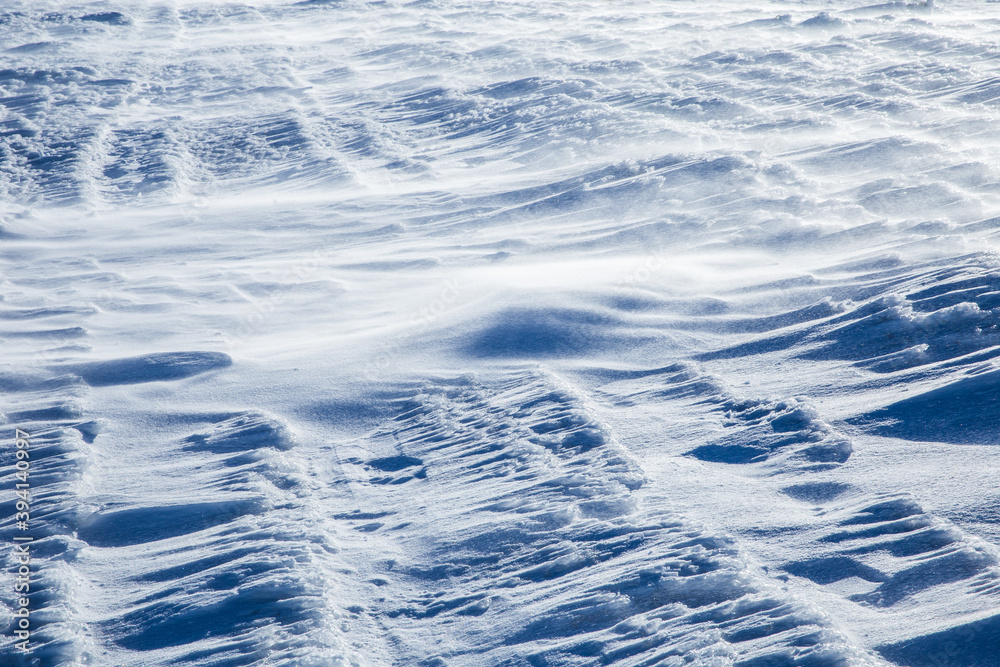 Abstract formations from snow and ice in heavy winter during blizzard. 