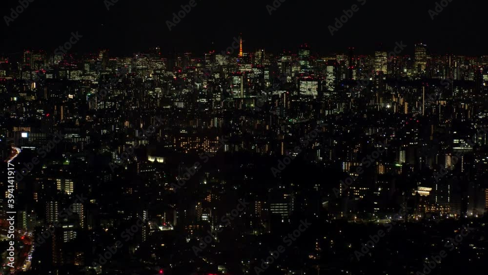 TOKYO, JAPAN : Aerial high angle sunrise CITYSCAPE of TOKYO. View of office buildings around Shinjuku and Minato ward. Japanese urban metropolis concept. Time lapse zoom in shot night to morning. TOKYO, JAPAN : Aerial high angle sunrise CITYSCAPE of TOKYO. View of office buildings around Shinjuku and Minato ward. Japanese urban metropolis concept. Time lapse zoom in shot night to morning.