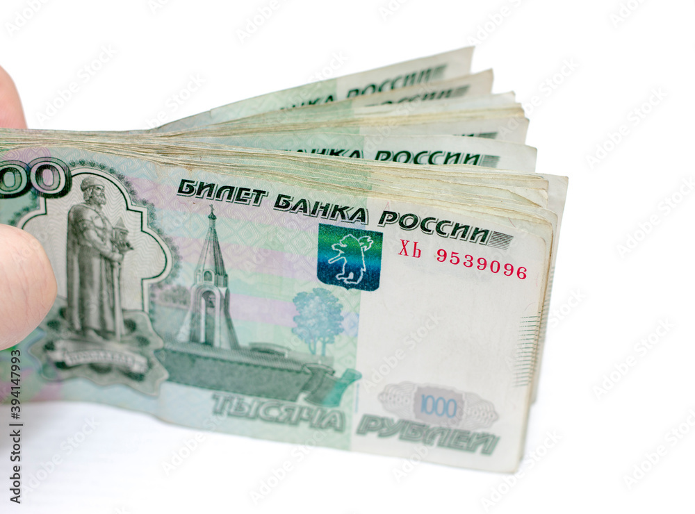 Scattered Russian 1000 rubles banknotes closeup Scattered Russian 1000 rubles banknotes closeup