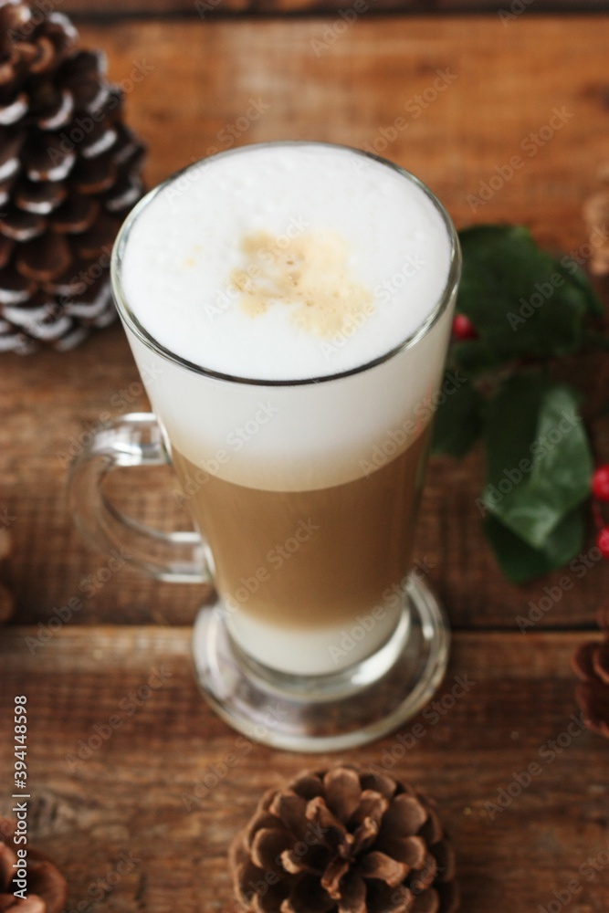 Coffee latte and forest cones on the table