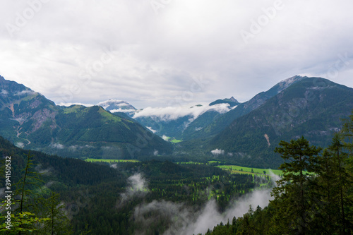 Clouds are rolling through after the rain in the alps Rofan summit, Maurach, Achensee, Pertisau, Tyrol, Austria