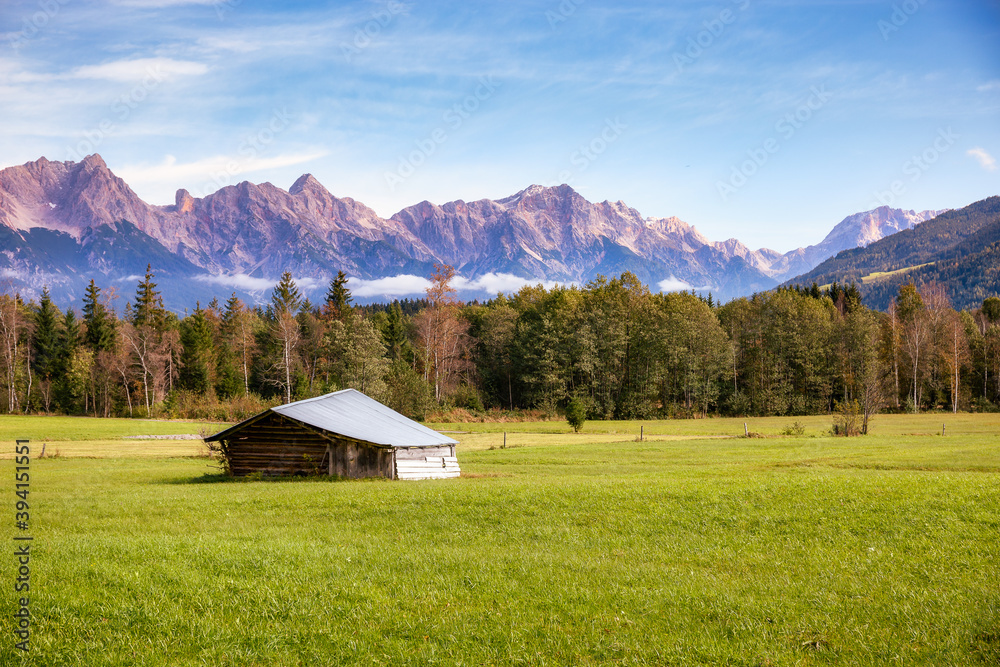Little shed in front of the alps