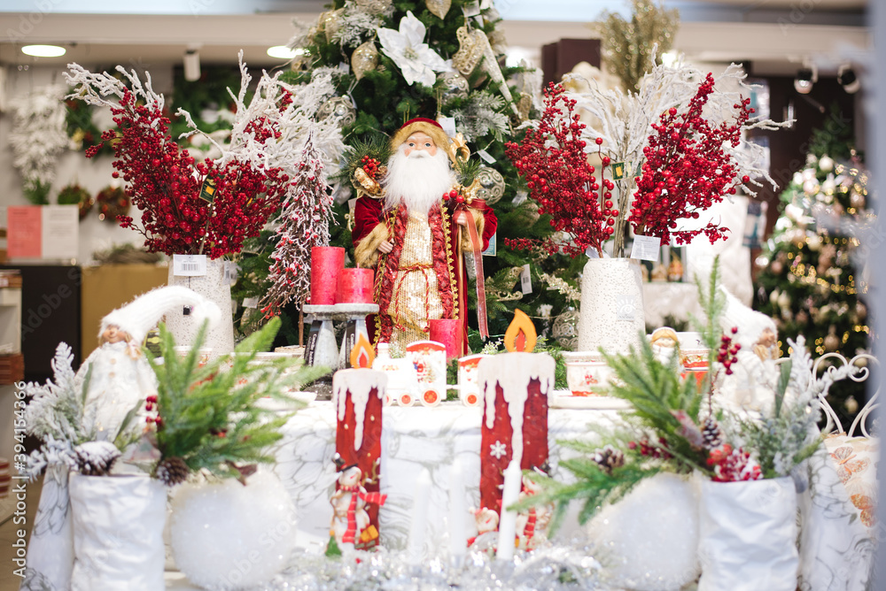 Christmas decor with santa claus and snow covered branches