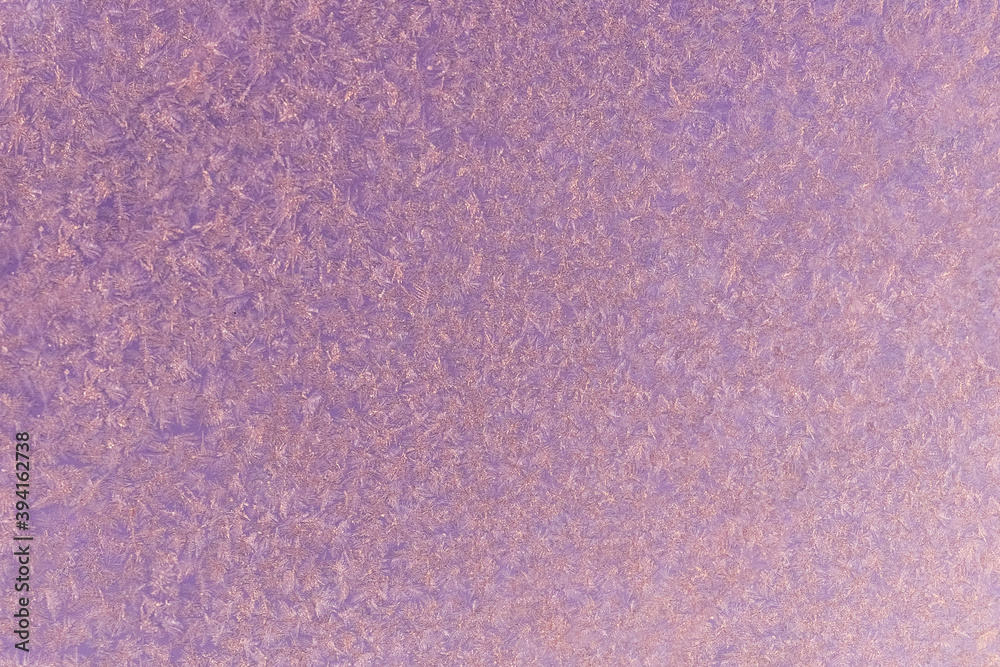 Fototapeta premium pink frost on a glass background. texture patterned frosted glass.