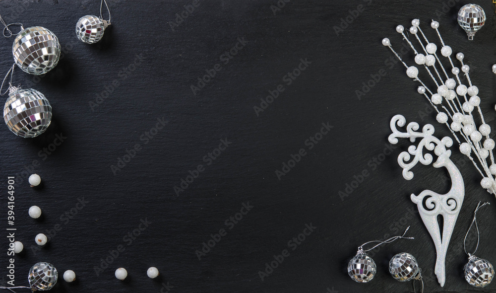 Christmas decoration. White deer and white balls.