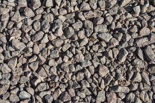 a fragment of the road surface of small stones