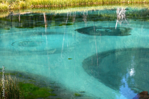 Blue lake in Altai taiga, South Siberia. Geyser Lake near Aktash village on Chuysky tract.