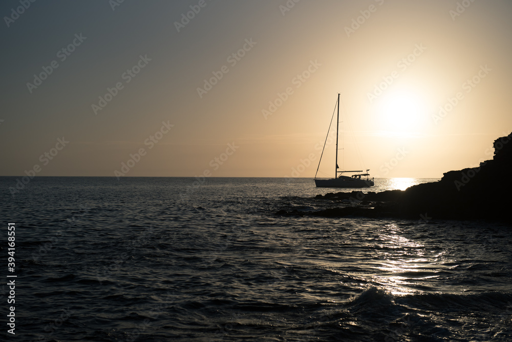 Boat at sunset in the Atlantic Sea on the Island of Fuerteventura in Spain