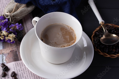 Hot coffee in white ceramic mug