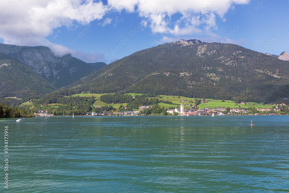 Lake Wolfgang with St. Wolfgang in the background, seen from the jetty in Gschwendt Lake Wolfgang with St. Wolfgang in the background, seen from the jetty in Gschwendt