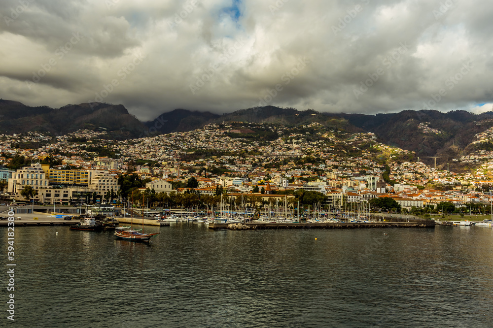 The promenade, marina and city of Funchal, Madeira from a ship in the harbour