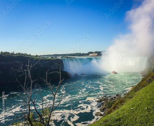 Niagara Falls, Canada, Sept 2019, view of a Hornblower Niagara Falls boat tour in the Horseshoe Falls mist