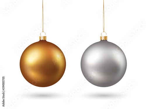 Set of gold and silver colored realistic shiny christmas baubles isolated on white background