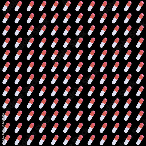 pattern of red pills on a black background